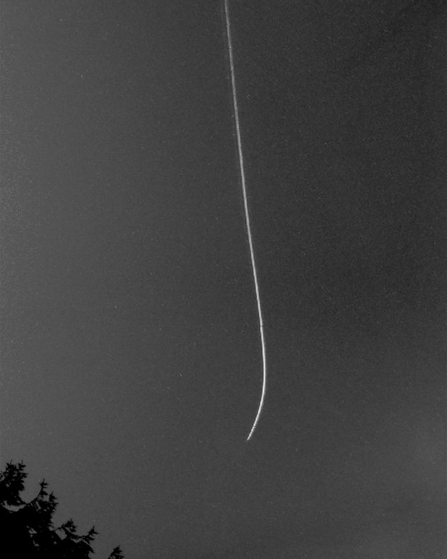 Satellite rising into the sunlight
